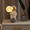 Astronaut lunar exploration desk lamp, bedroom bedside desk decoration, 3D lunar decorative lamp, modern aerospace astronaut lighting fixtures Application Scenario